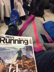 Mens Running UK to read whilst waiting for plane at Bristol airport